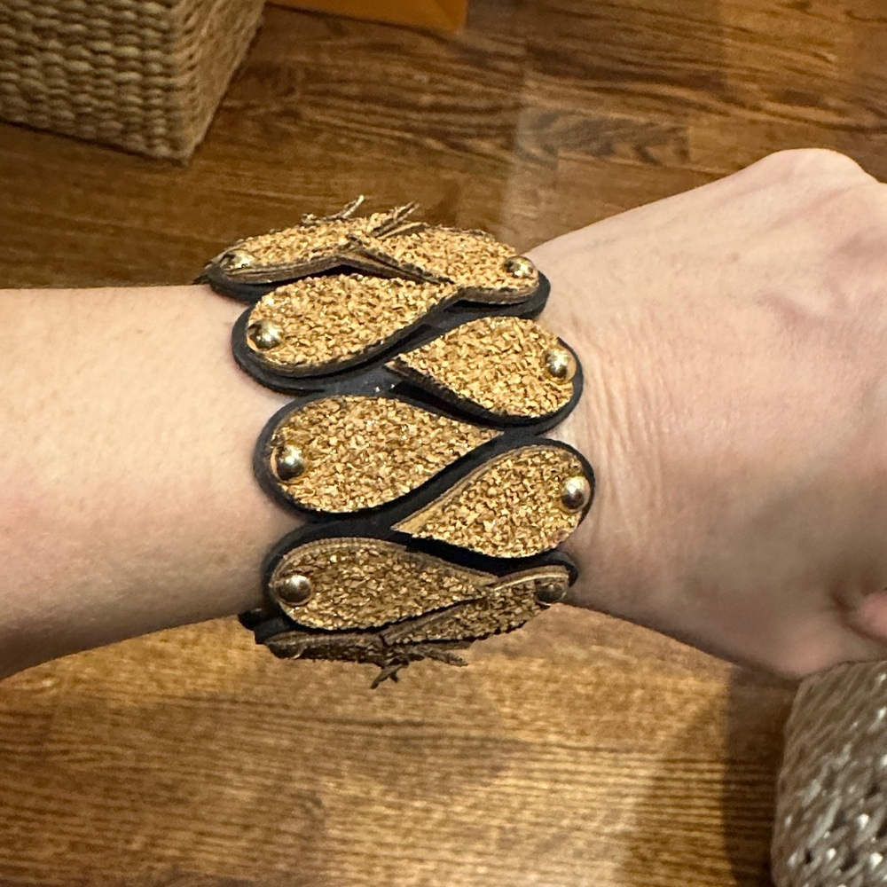 Elegant Gold and Black Textured Bracelet